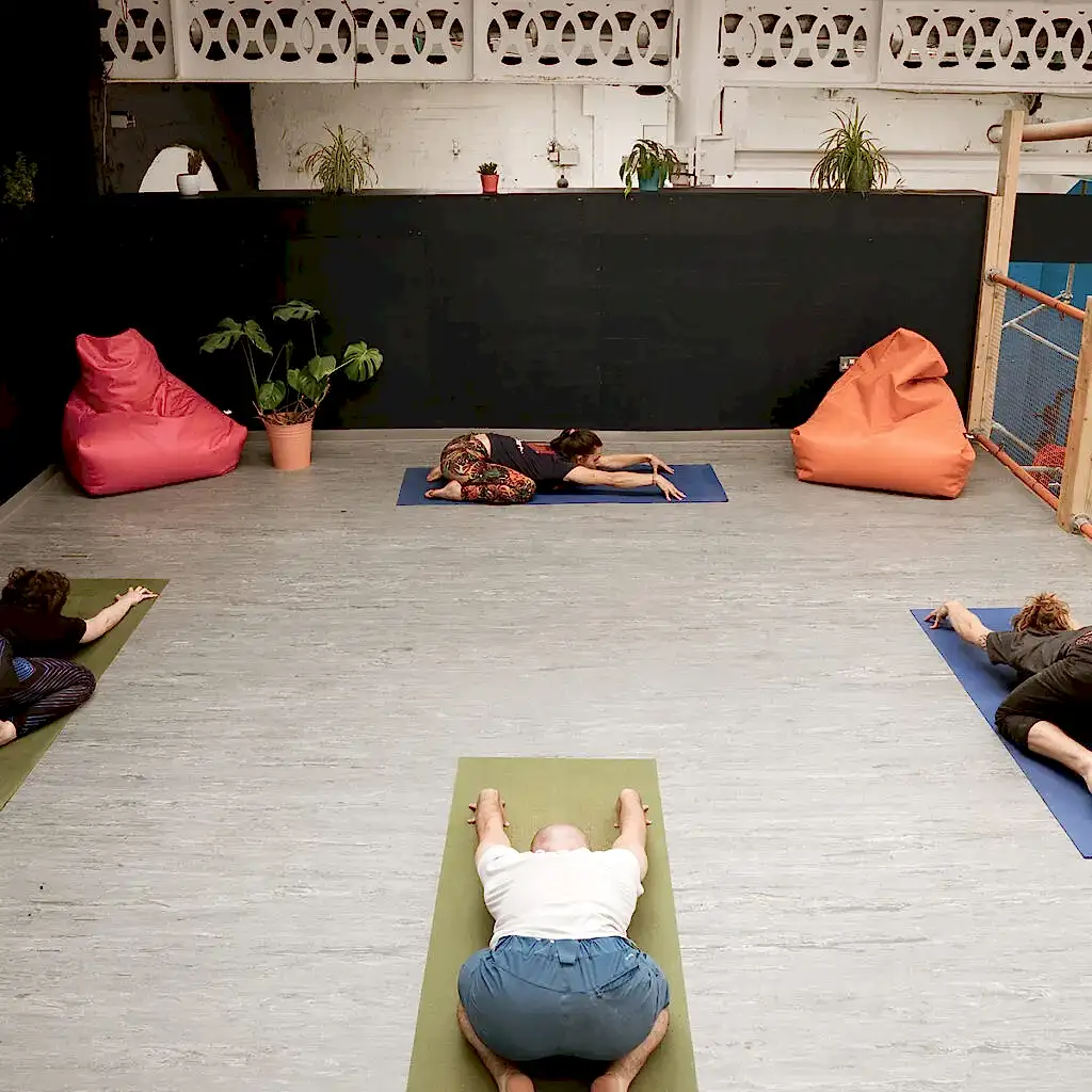 Social distance yoga at city bloc